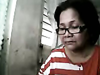 Lustful 61 yo Asian granny fondles her pussy on webcam