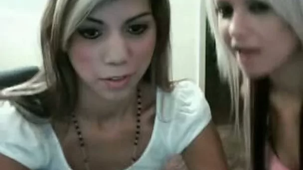 Tight and young webcam lesbies diddle each other's cunts for me