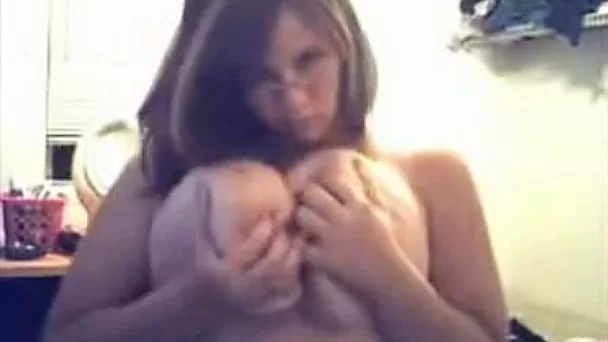 White nerdy webcam girl shows me off her giant natural tits