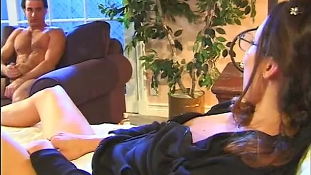 Attractive nerd chick  masturbates in bed in front of her boyfriend