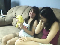 Filthy lesbian hoe is getting her pussy pleased with banana