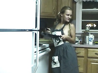 Just a horny and skinny blondie in the kitchen playing