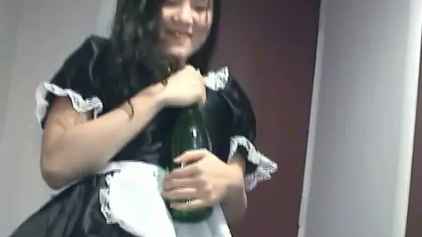 Frisky Asian housemaid masturbates with big bottle