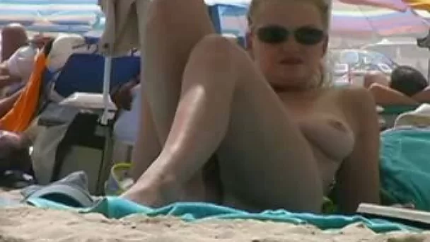 Sexy pale skin bitch caught reading book on nude beach all naked