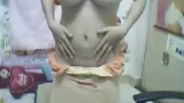 Bosomy brunette teen from Vietnam shows off her big titties