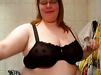 Fat redhead mature lady is proud of her big boobies