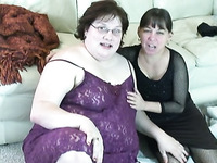 Disgusting fatso gets straponed smiling brunette MILF