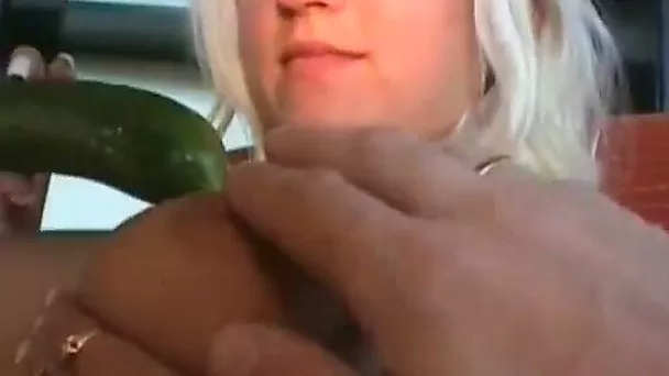 Wondrous busty blonde chick masturbates with cucumber