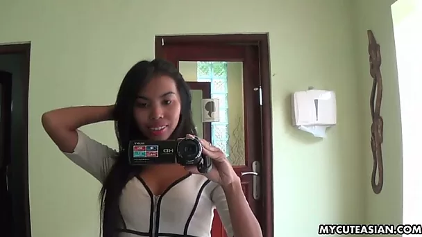 Torrid and voracious raven haired amateur bitch flashes her Asian titties
