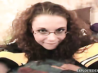 Curly nerdy amateur whore has a glass dildo to pet her own pussy