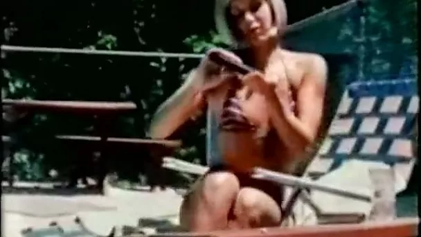 Luxurious light-haired babe swims in a pool before sapphic action