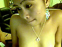 Charming brunette Filipina girl brags off her natural tits on webcam