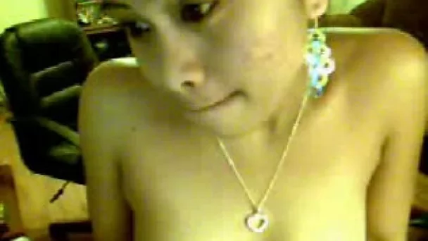 Charming brunette Filipina girl brags off her natural tits on webcam