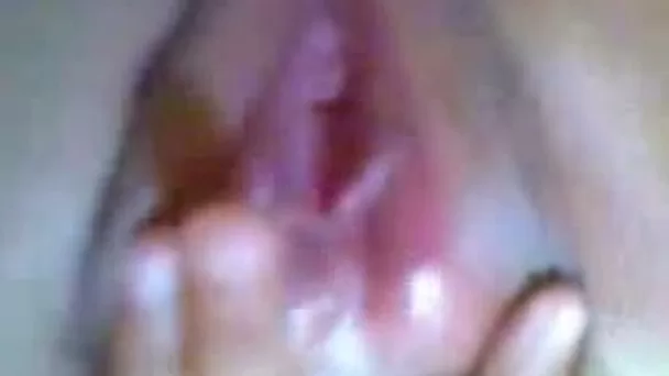 Selfie of my young chubby Indonesian girl rubbing her tight hairy pussy