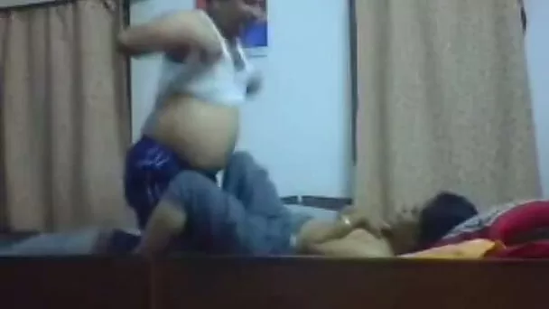 Horny amateur Indian couple is having steamy foreplay in front of the camera