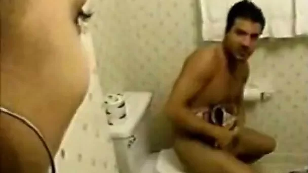 Kinky Indian slut finds a guy wanking in the bathroom so she helps him out with stout blowjob