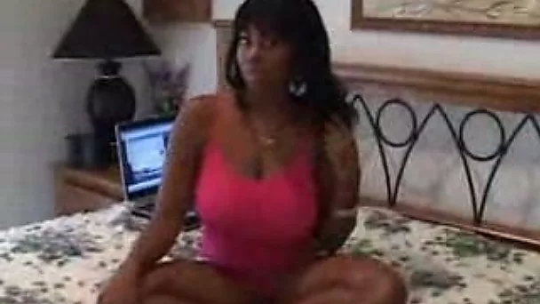 Classy ebony tramp with huge hooters blows and gives me a titjob
