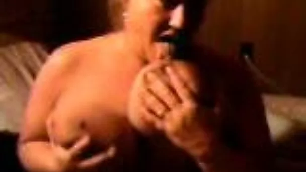 My fat and cute wife licks jizz off her huge boobies