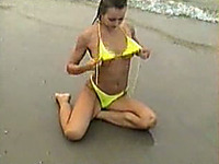 My gorgeous wife in bikini masturbating on the beach