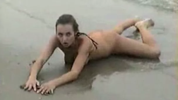My sexy wifey posing for me all naked on the wild beach