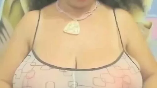 Busty webcam chick shows off her huge headlights