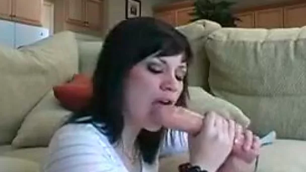 Eye catching brunette pokes her hungry mouth with awesome big dildo