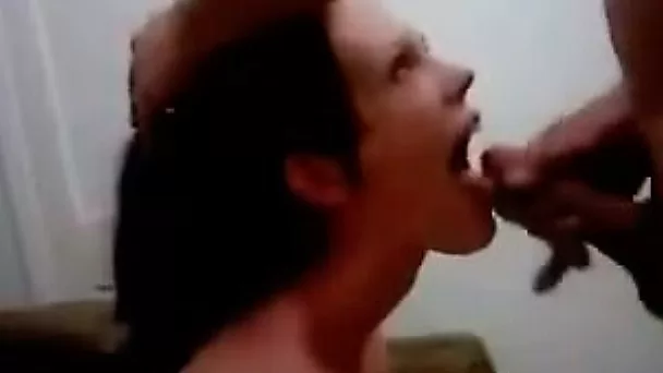 Brunette bitch opens her mputh widly and gets the cock inside