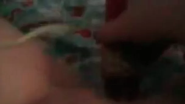 Sexy bitch with phone in one hand and dildo in the other one