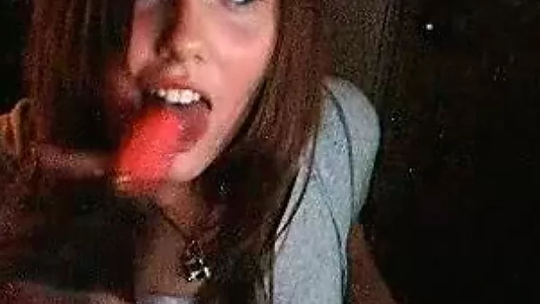 Young and sexy runette bitch with nice face licks the dildo