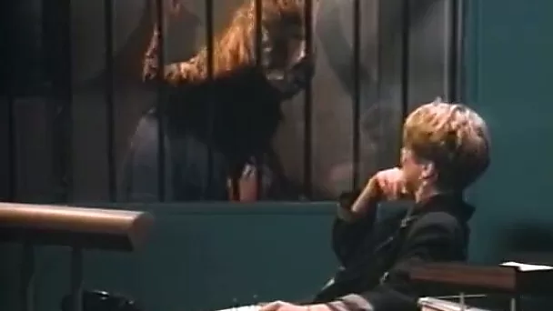 Kinky warden strips scofflaws in a jail at her night shift