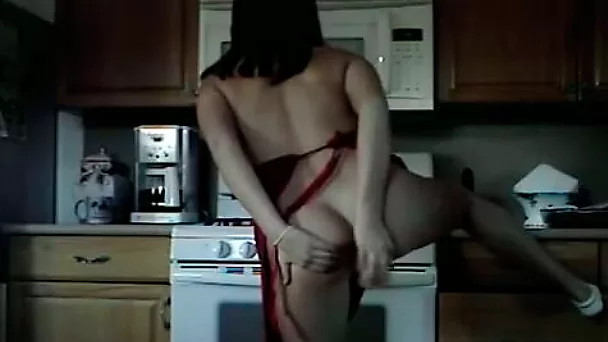 Bootylicious babe poking her dildo into her tight pussy from behind