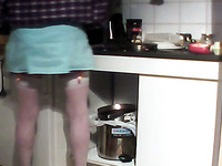 Kinky dude in stockings caught on hidden camera while cooking