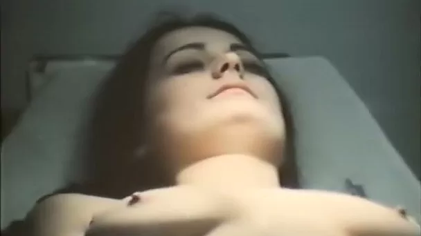 Two kinky doctors enjoy watching big titties of their brunette patient