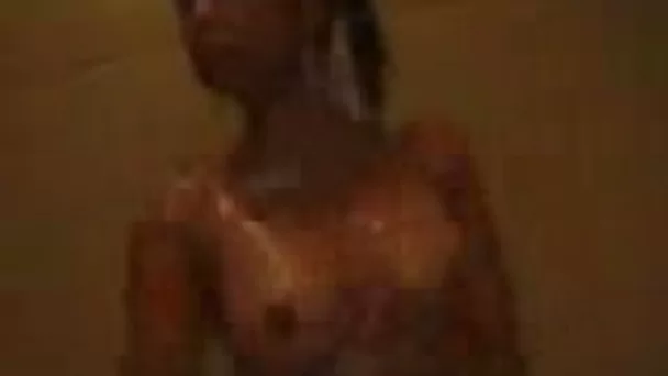 My cute black haired Asian girlfriend takes shower while I shoot
