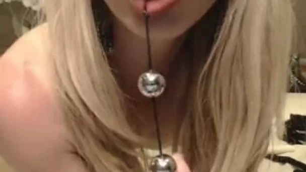 horny blonde girl fucks herself with a long dildo