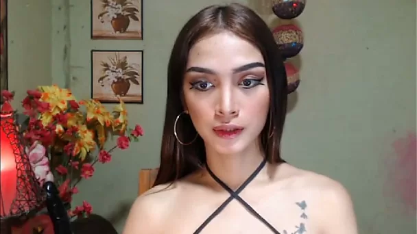 Shemale teasing you with her 9 inch dildo