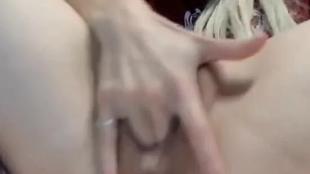 hot slut masturbating with a pink vibrator in her pussy