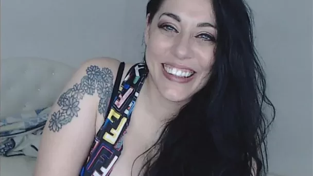 Brunette flashes huge tits on cam