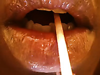 Check out juicy glossed soft lips sucking a lollipop