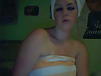 Classy brunette seductress takes a shower on webcam