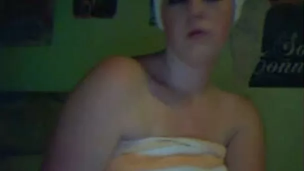 Classy brunette seductress takes a shower on webcam