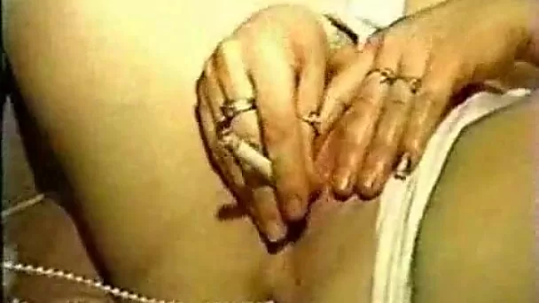 Watch perverted smoking amateur whore working on her wet cunt