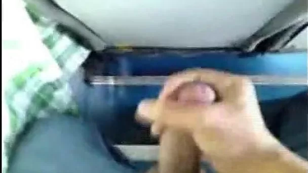 Horny amateur dude keeps jerking his dick right in the public bus