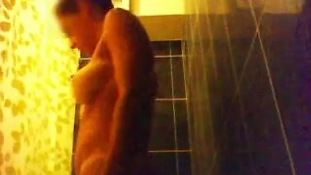 23 y.o French girl with big boobs and ass is spied in a shower