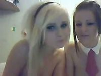 Lusty couple of perky boobed lesbies show off their assets on webcam