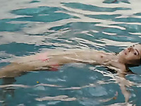 Weronika Rosati flashes her really nice tight titties in the pool