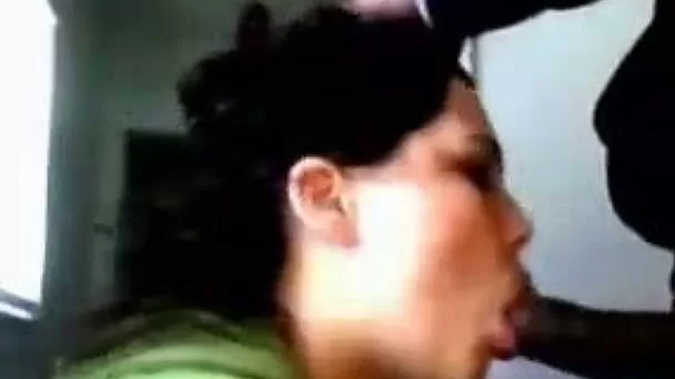 Raven-haired slut smoking cigarette while sucking BBC