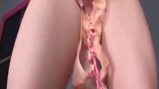 Big titted slut plays with her pink pussy in arousing porn video