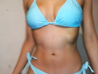 this indian girl show off her cyan swimsuit and her heavenly shaped body