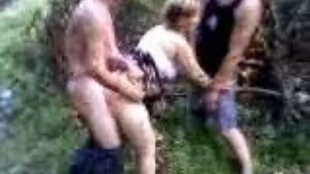 Deep in the woods my slut wife serves her cunt for two huge dicks